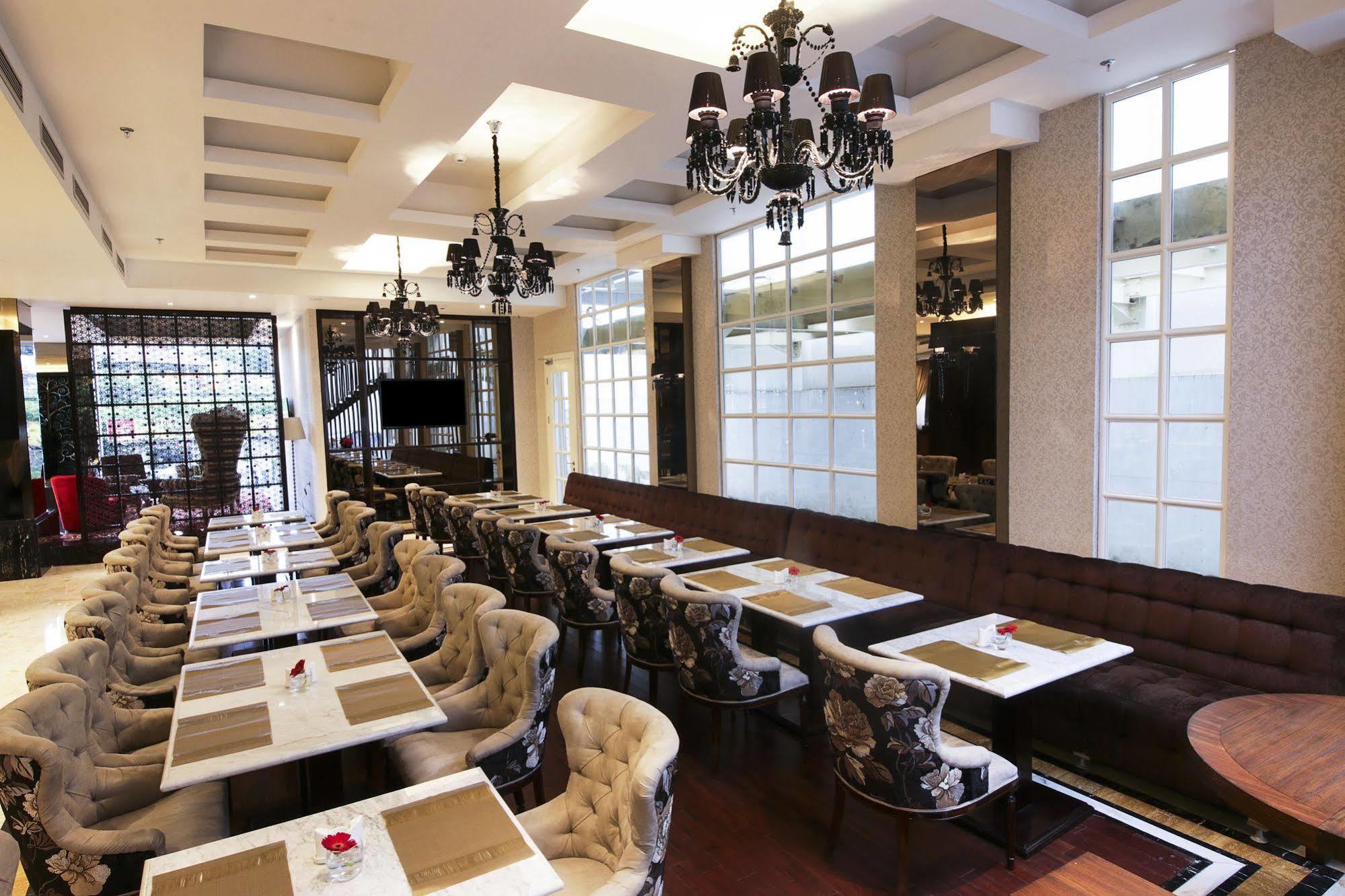 Cinnamon Hotel Boutique Syariah Tutugan Esterno foto